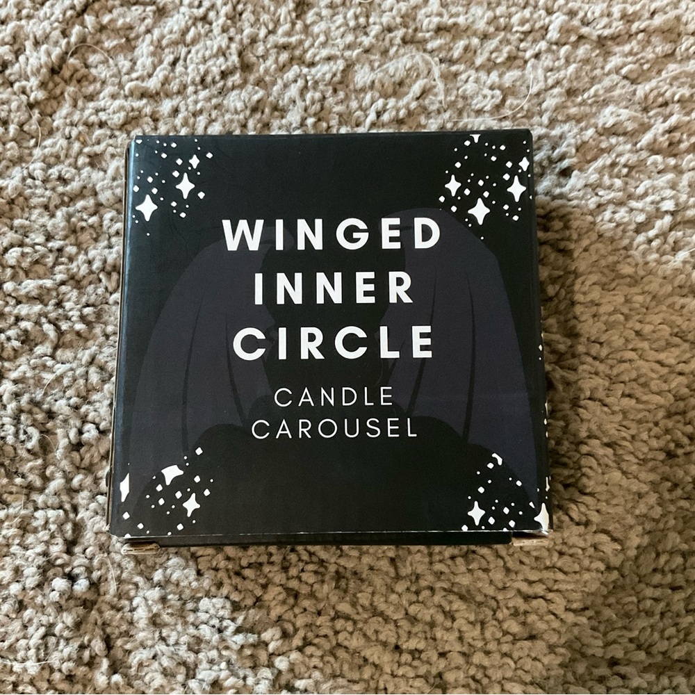 Winged Inner Circle Candle Stand